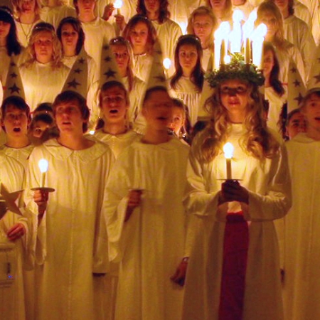 Choir in robes with candles